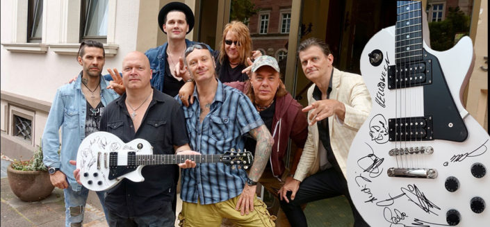 HELLOWEEN Signed Epiphone Les Paul Taken from Helloween stock, this guitar is Arctic White and is signed by all members of Helloween and includes a fantastic picture of the band, with the guitar